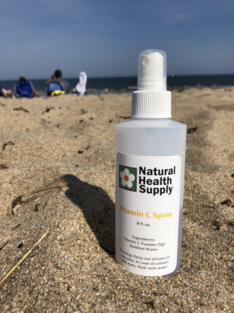 Vitamin C Spray for sun protection at the beach